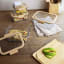 Pebbly Rectangular Glass Containers with Vacuum Pump, Set of 5 with food on the table