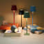 Atticus Tall Portable & Rechargeable Lamp - Black, mocha, ice blue, red and grey in use on counter