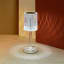 Atticus Portable & Rechargeable Lamp - Clear - white light in use on counter