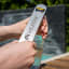 Meater Magnetic Hanger and Bottle Opener with a beer bottle