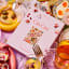 Piecework Puzzles Cin Cin 1000 Piece Puzzle on the table with food