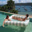 Sunnylife Luxe Twin Hammock Float - The Vacay Olive in the pool