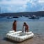 Sunnylife Luxe Twin Hammock Float - The Vacay Olive floating on water