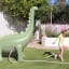 Sunnylife Giant Dino Sprinkler in the lawn