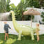 Sunnylife Giant Dino Sprinkler in the lawn