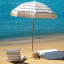 Sunnylife The Resort Luxe Beach Umbrella - Coastal Blue at the beach