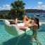 Sunnylife Luxe Lie-On Lounger Float - The Vacay Sage in a pool