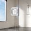 Ecovacs Winbot W2 Smart Window Cleaner showing movement on a window