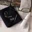 Gentlemens Hardware Squeaky Clean & Repair Kit on the table with a pair of spectacles 