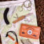 Gentlemens Hardware Survival of The Fittest Kit on the ground with a map