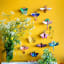 Studio ROOF Honey Bee Wall Decor on the wall with other designs