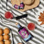 Monark Distillery Ultra Violet Gin, 750ml on a picnic blanket