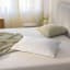 Tempur Prima Pillow - Medium on the bed