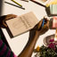 Designworks Ink Vintage Sass Shiitake Happens Notebook with Pen on the table