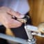 Gentlemens Hardware Pocket Bicycle Multi-Tool fixing a bicycle