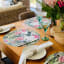Skoert Protea Disposable Placemats, Pack of 25 on the table with cutlery