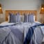 Aranda Midnight & Overcast Sky Geometry Protea Throw, 200cm x 240cm on the bed