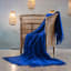 Aranda Midnight Melody Throw, 150cm x 200cm on a chair