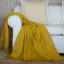 Aranda Gold Nugget Melody Throw, 150cm x 200cm on a couch
