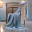 Aranda Eggshell Melody Throw, 150cm x 200cm on a chair
