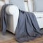 Aranda Iron Melody Throw, 150cm x 200cm on a couch