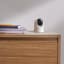 Eufy 2K Pan & Tilt Indoor Security Camera on a side drawer