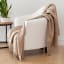 Linen House Cashmere Embrace Throw on a chair