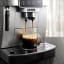 DeLonghi Magnifica Start+ Bean-to-Cup Coffee Machine with a cup of coffee