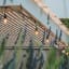 Litehouse Traditional Plug-In LED Festoon Outdoor Bulb String Lights, 15m hanging on a rail