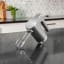 Russell Hobbs Cordless Rechargeable Hand Mixer, 200W on the kitchen counter