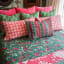 India Ink Green Bird of Paradise Kantha Stitched Throw - Double on the bed
