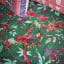 India Ink Green Bird of Paradise Kantha Stitched Throw - Double detail on the bed