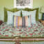 India Ink Aqua Bird of Paradise Kantha Stitched Throw - Double on the bed