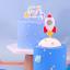 PME Multicolour Happy Birthday Candle - Blue on a cake