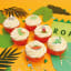 PME Edible Cupcake Toppers, Set of 6 - Dinosaur on the table