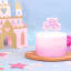PME Happy Birthday Sparkly Candle - Pink on a cake