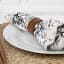 Nicolson Russell Dark Wood Napkin Rings, Set of 4 on a napkin