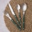 Nicolson Russell Louisiana Cutlery Set, 16-Piece - Dark Green on a table mat