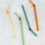 Nicolson Russell Vintage Glass Straws, Set of 4 - Sunrise on the table
