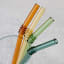 Nicolson Russell Vintage Glass Straws, Set of 4 - Sunrise on the table