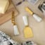 Nicolson Russell Marble Cheese Knife Set, Set of 3 on the table