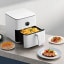 Xiaomi Smart Air Fryer, 6.5L with food on the table