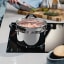 Tramontina Solar Stainless Steel Steamer Set, 2-Piece on the stove