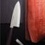 Tramontina Deba Silver Sushi Knife, 20cm on the table
