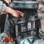 Kulgo Black Picnic Cooler with a bottle of champagne