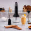 Smeg Retro Hand Blender 4-Piece, 700W - Glossy Black on the kitchen counter