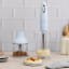 Smeg Retro Hand Blender 4-Piece, 700W - Pastel Blue on the kitchen counter