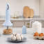 Smeg Retro Hand Blender 4-Piece, 700W - Pastel Blue on the kitchen counter