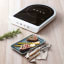 Smeg Portable Induction Plate with Probe - Matte White with a plate of food