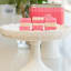 Navinos Coconut Ice Fudge on a cake stand